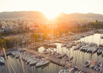 Camper & Nicholsons establishing a new office in Athens, MTB Events, Image shows Port Piraeus in Athens, lots of yachts at sunset
