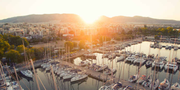 Camper & Nicholsons establishing a new office in Athens, MTB Events, Image shows Port Piraeus in Athens, lots of yachts at sunset