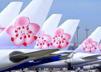 China Airlines signs order for eight Boeing 787 passenger aircraft, MTB Events, image shows the tail of six China Airlines aircraft all with the pink blossom logo