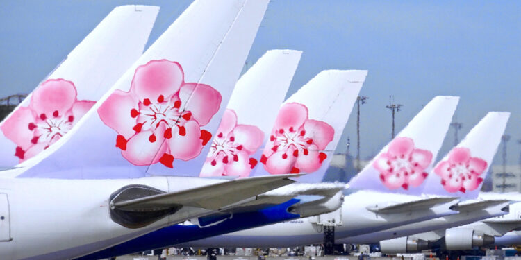 China Airlines signs order for eight Boeing 787 passenger aircraft, MTB Events, image shows the tail of six China Airlines aircraft all with the pink blossom logo