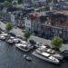 Feadship Heritage Fleet brought together in The Netherlands, MTB Events, image shows the Haarlem Spaarne River with a collection of superyachts sailing and moored up