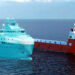 VARD presents development of PIEZO's battery powered PSV, MTB Events, Image shows a red and white PSV alongside the same vessel but fully light blue and slightly see through to show the simulation, both are in the ocean with blue skies