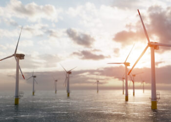 Partnership created between ESB and Ørsted in landmark Irish offshore wind agreement, MTB Events, image shows offshore wind farm, calm seas and sunrise