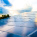 SUSI Partners holds final close for Southeast Asia Energy Transition Fund, SAETF, MTB Events, image shows rows of solar panels in the foreground, background has silhouettes of trees against the sunset