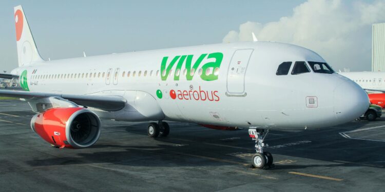 Viva Aerobus sign for 90 GTF Powered, Airbus A321, MTB Events. Image shows Airbus A32008 on the runway with the Viva Aerobus logo on the side.