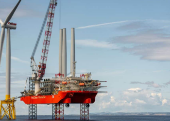 Exciting milestone for NnG as first wind turbine is installed, MTB Events. Image shows the installation of the turbine by the Blue Tern.