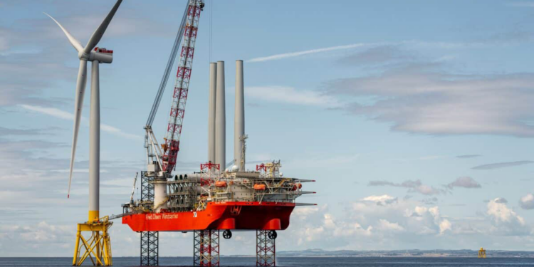Exciting milestone for NnG as first wind turbine is installed, MTB Events. Image shows the installation of the turbine by the Blue Tern.