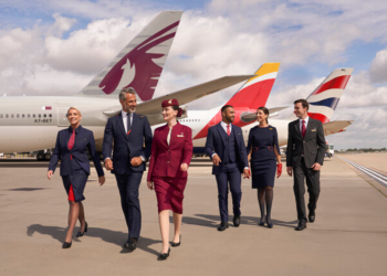 Iberia, British Airways & Qatar join together to form the world's largest Airline business, MTB Events, Image shows 6 people from airlines in front of each airlines plane lined up together on the runway