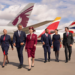 Iberia, British Airways & Qatar join together to form the world's largest Airline business, MTB Events, Image shows 6 people from airlines in front of each airlines plane lined up together on the runway