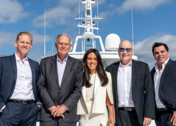 Ahoy Club & Ray White Marine merge to create a maritime powerhouse, MTB Events. Image shows 5 leaders of the retrospective companies aboard a yacht