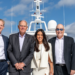 Ahoy Club & Ray White Marine merge to create a maritime powerhouse, MTB Events. Image shows 5 leaders of the retrospective companies aboard a yacht