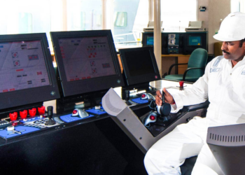 Elcome acquires a majority stake in Fabio Fiorucci, MTB Events. Image shows a member of Elcome in a white helmet and clothes using a navigation system