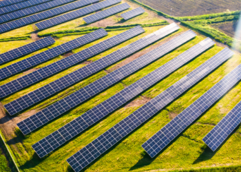 Voltalia & Power Capital Renewable Energy to build four photovoltaic projects, MTB Events. Image shows a solar energy farm in a field taken by an aerial drone