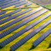 Voltalia & Power Capital Renewable Energy to build four photovoltaic projects, MTB Events. Image shows a solar energy farm in a field taken by an aerial drone