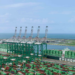 Taiwan celebrates first automated container terminal with Evergreen, MTB Events. Image shows Terminal 7 at Kaohsiung port, Taiwan. Lots of green containers on the portside and on three large shipping vessels