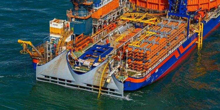 Balmoral floats into the offshore wind sector, MTB Events. Image shows a fibre flex installation on a large blue and red vessel at sea