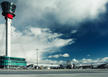 Heathrow begins revolutionary trials using low carbon concrete, MTB Events, Image shows a control tower at Heathrow Airport with clouds