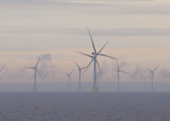 Ocean Winds sell majority stake of Moray East offshore wind farm, MTB Events. Image shows Moray East wind fatm out at sea on a foggy day