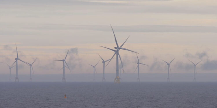 Ocean Winds sell majority stake of Moray East offshore wind farm, MTB Events. Image shows Moray East wind fatm out at sea on a foggy day