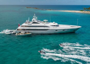 Major European expansions for FGI Yacht Group with new office in Monaco, MTB Events. Image shows 181-foot Superyacht called Turquoise in the sea with two jet skis.