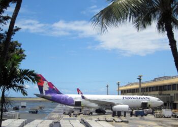 Alaska Air Group acquires Hawaiian Airlines creating more choice for travellers, MTB Events. Image shows an Hawaiian Airlines A330-200 at Honolulu International Airport, Oahu, Hawaii