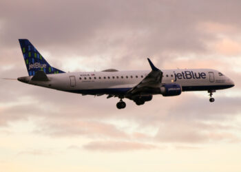 JetBlue to be the first US airline with a female CEO, MTB Events. Image shows a JetBlue flight at sunrise
