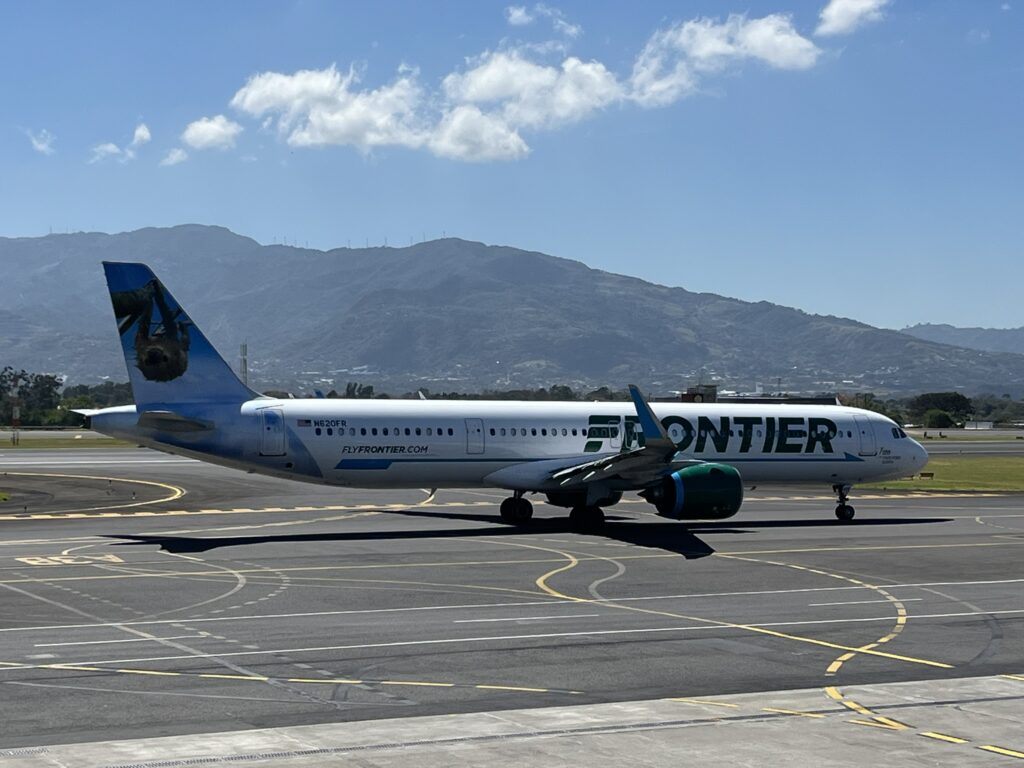 Tico the Sloth lands at Juan Santamaría International Airport, MTB Events. Image shows plane with tico the sloth on the tail