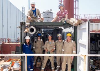 British climate tech startup successfully completes sea trials, MTB events. Image shows the a group of Seabound workers in and around a shipping container in Yalova, turkey.