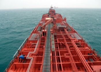 ORIX to acquire all shares from Osaka's biggest shipowner, MTB Events. Image shows the top of a red vessel.