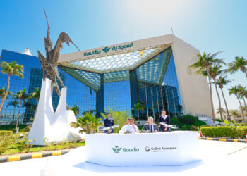 Agreement between Saudi and Collins Aerospace to elevate guest experience, MTB Events. Image shows the outside of a Saudia building with the signing taking place between the two heads of business.