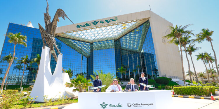 Agreement between Saudi and Collins Aerospace to elevate guest experience, MTB Events. Image shows the outside of a Saudia building with the signing taking place between the two heads of business.