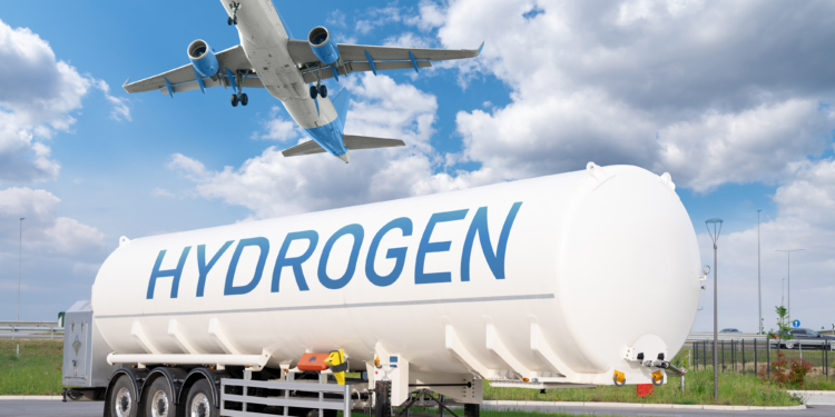 UK Civil Aviation Authority announces first companies for Hydrogen Challenge, MTB Events. Image shows a larger tanker with the word 'HYDROGEN' printed on the side. A plane is also coming into land.