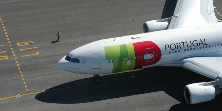 Record net income of EUR 177.3 million for TAP Air Portugal in 2023, MTB Events. Image shows an Airbus A330 on the tarmac with the TAP Air branding on the fuselage