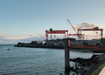 Study completed by Amogy and MSB into ammonia power, MTB Events. Image shows a shipyard at sunset in Japan