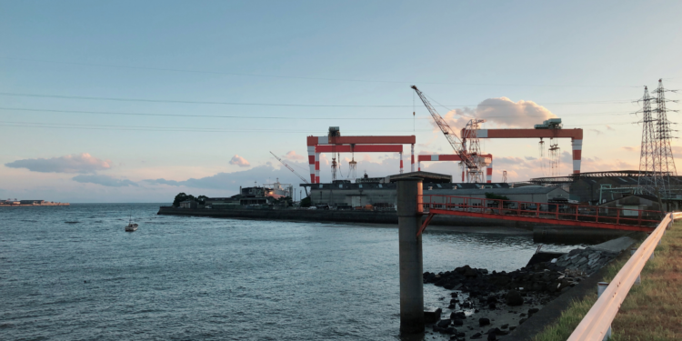 Study completed by Amogy and MSB into ammonia power, MTB Events. Image shows a shipyard at sunset in Japan