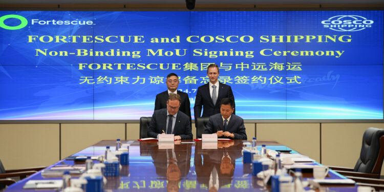 A collaboration to work towards decarbonisation: Fortescue and COSCO sign MoU, MTB Events. Image shows the signing ceremony attended by 4 people