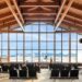 8 of the most beautiful airports in the world, MTB Events. Image shows the inside of Bozeman Yellowstone Airport, the view of the Bridger Mountain Range from a large window