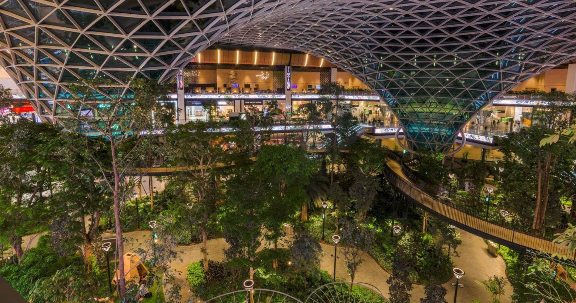 8 of the most beautiful airports in the world, MTB Events. Image shows the inside of Hamad International Airport, the indoor tropical garden in the indoor shopping centre.