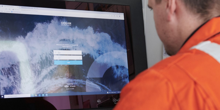 Lloyd's Register to become one of the largest software platforms with the acquisition of OTG, MTB Events. Image shows a person in orange high vis jacket looking at a computer screen with the Ocean Technologies software on. Image sourced from Ocean Technologies Group.