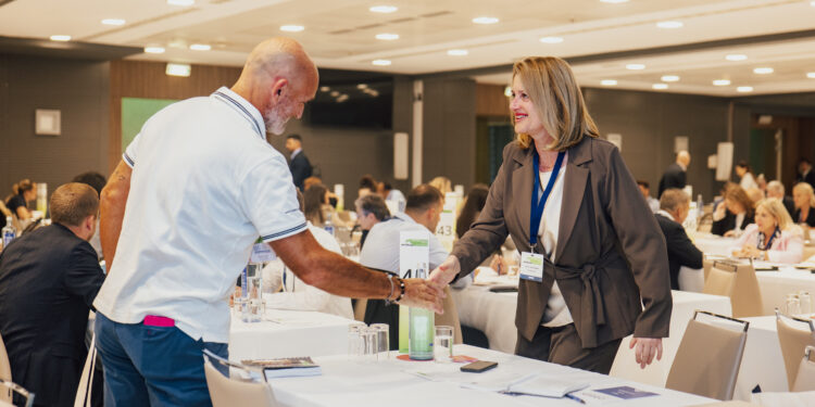 MTB Marine Europe: Another year, another massive triumph!, MTB Events. Image shows a photo of two delegates shaking hands