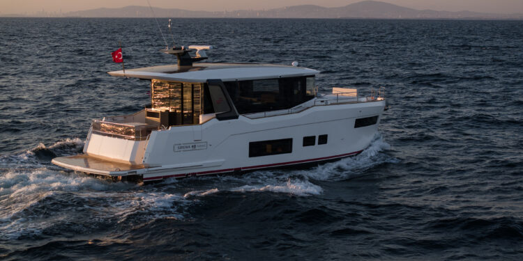 The new Sirena 48 Hybrid Coupe introduces silent electric cruising to the market, MTB Events. Image shows the Sirena 48 Hybrid Coupe sailing at sunset.
