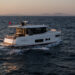 The new Sirena 48 Hybrid Coupe introduces silent electric cruising to the market, MTB Events. Image shows the Sirena 48 Hybrid Coupe sailing at sunset.