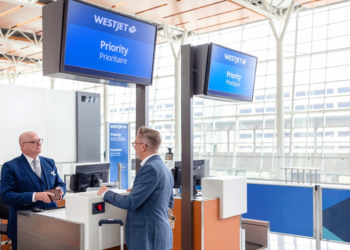 WestJet improves cabins on Boeing 737 aircraft while growing its fleet, MTB Events. Image shows a WestJet gate at an airport that has signage showing Priority boarding