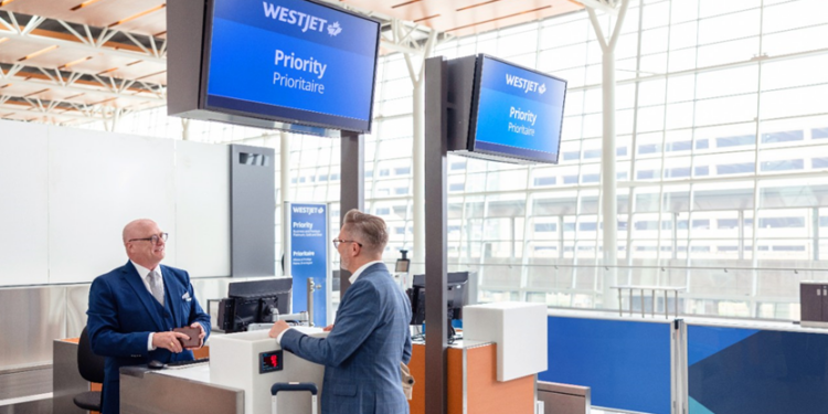 WestJet improves cabins on Boeing 737 aircraft while growing its fleet, MTB Events. Image shows a WestJet gate at an airport that has signage showing Priority boarding