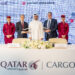 Qatar Airways Cargo and Japan Airlines Strengthen Cargo Partnership with MoU, MTB Events. Image shows members of both airlines t the signing ceremony holding model planes.
