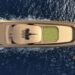 Allstars Design Unveils LAYRA and AURA: Two Exclusive Superyacht Concepts Presented at MTB Superyacht 2025, MTB Events. Image shows the Project Aura concept art of a golden coloured superyacht sailing on dark blue water