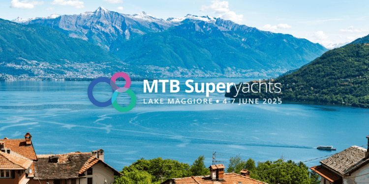 MTB Superyachts powering partnerships on Lake Maggiore , MTB Events. Image shows a view of Lake Maggiore over some houses with mountains in the background