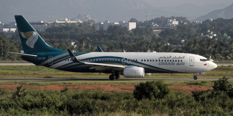Oman Air Joins oneworld Alliance, Expanding Middle East Reach for Global Travelers, MTB Events. Image shows Oman Air Boeing 737-800 registered A4O-BP at Kempegowda Int'l Airport, Bangalore