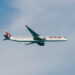 Image shows a Qatar Airways flight in the sky with thin clouds behind the plane. Qatar Airways Expands Flight Frequencies to More Than 15 Destinations, MTB Events.