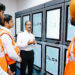 Image shows 4 men in orange jackets - Seafarer training on alternative fuels: the new methanol bunkering simulator from Wärtisä at BSM's Maritime Training Centre in Kochi ©BSM. BSM Unveils First Methanol Bunkering Simulator at Kochi Training Centre in Collaboration with Wärtsilä, MTB Events.